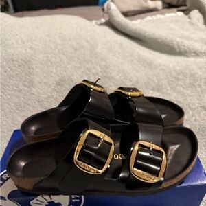 Birkenstock Black Slides with Gold Accents